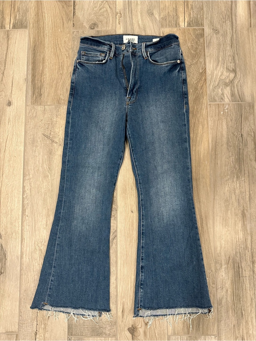 Frame Denim Dark Blue Flare Jeans with Raw Hem